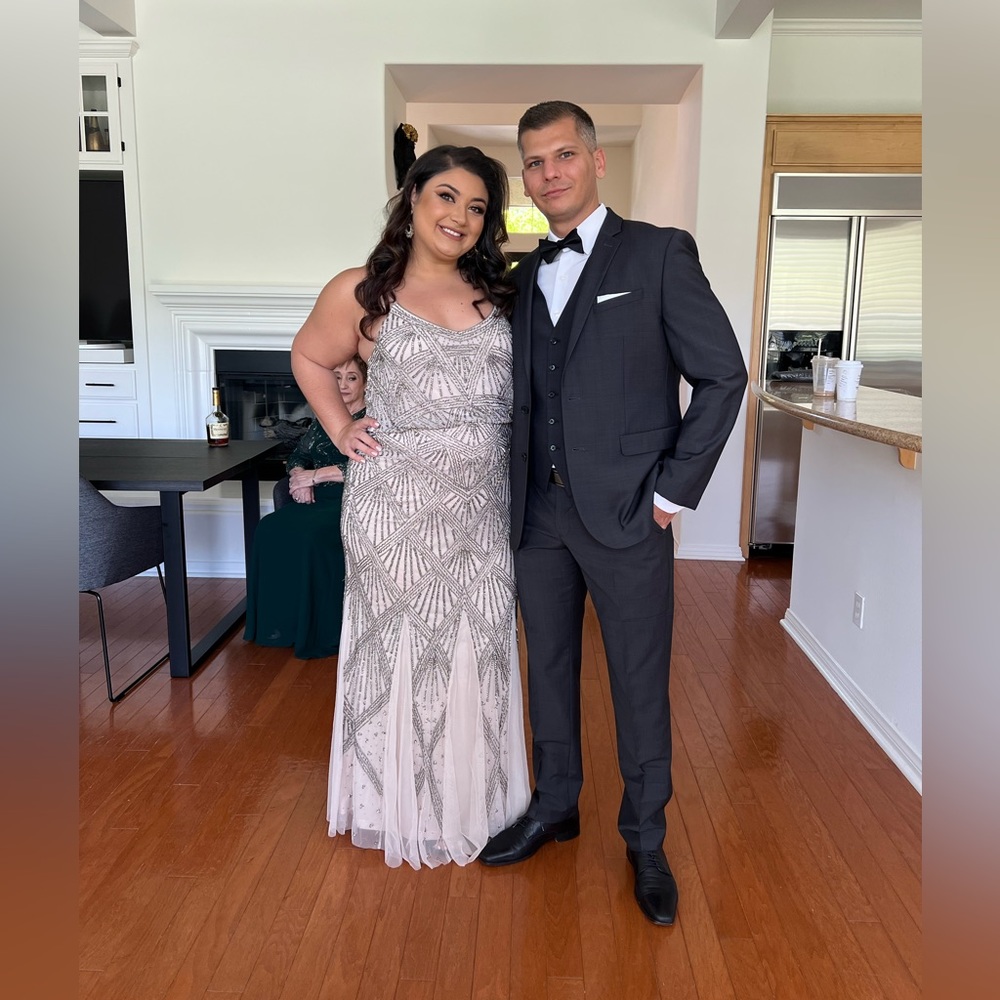 Hand embroidered beaded and tulle evening gown